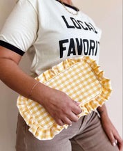 Green Gingham Frilly Makeup Bag showing lining on the inside for easy cleanup