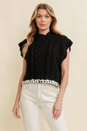 Black Cable Knit Sweater Vest — color: black and mock neckline