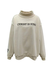 Beige 'CHRIST IS KING' Embroidered Mockneck — drop shoulder and long sleeves