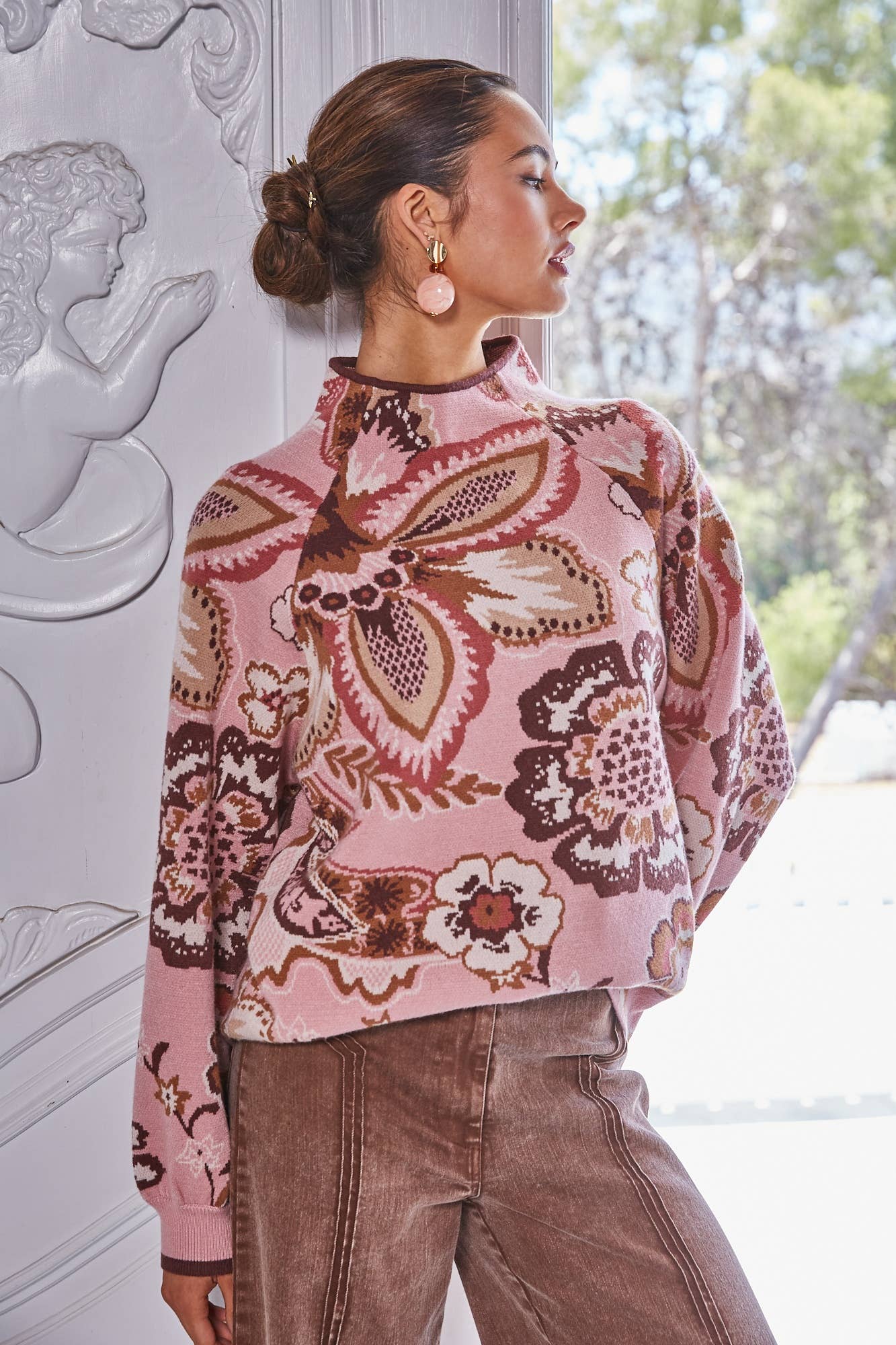 Pink Floral & Paisley Funnel Sweater in a relaxed