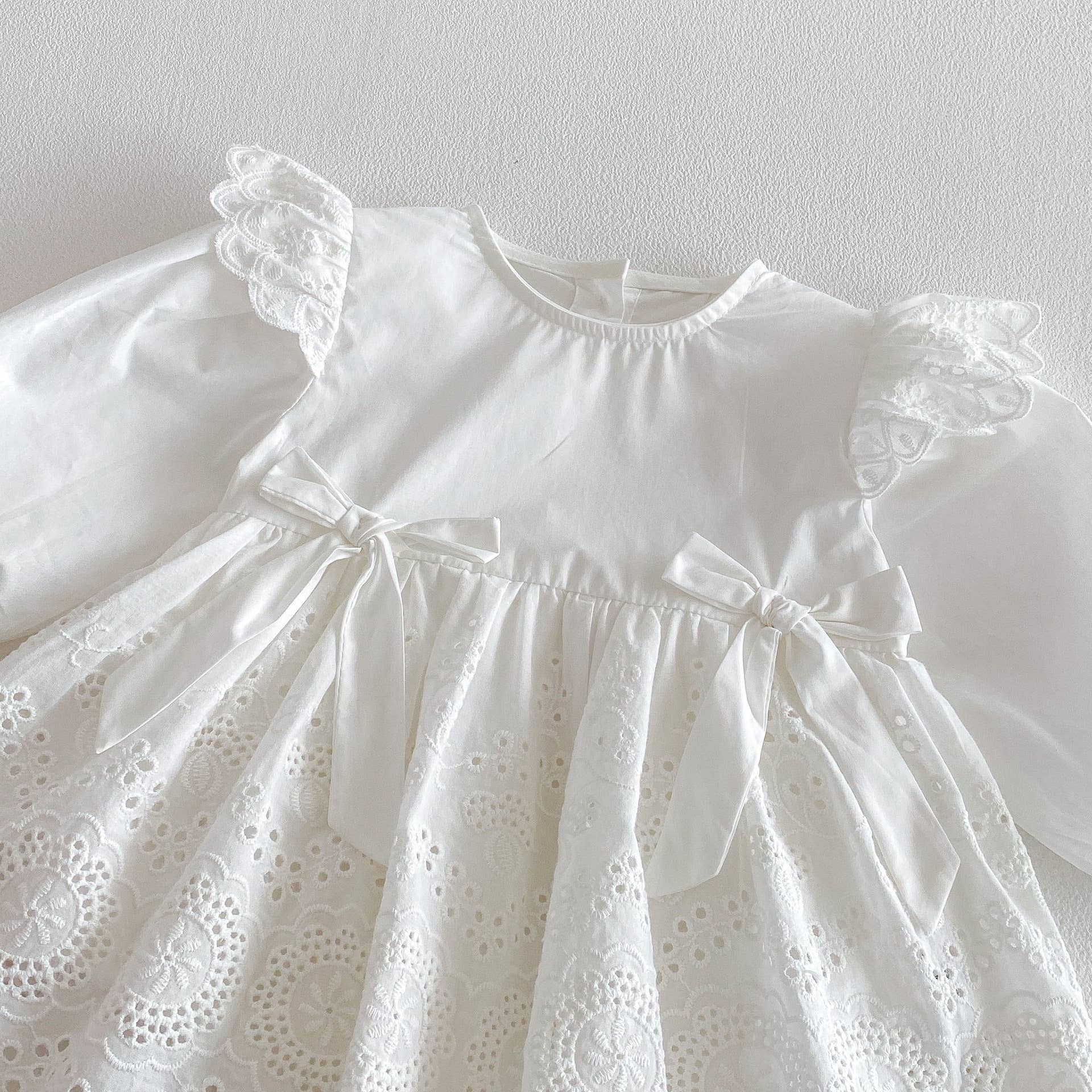 White Lace Baby Romper Dress with Bow Detail