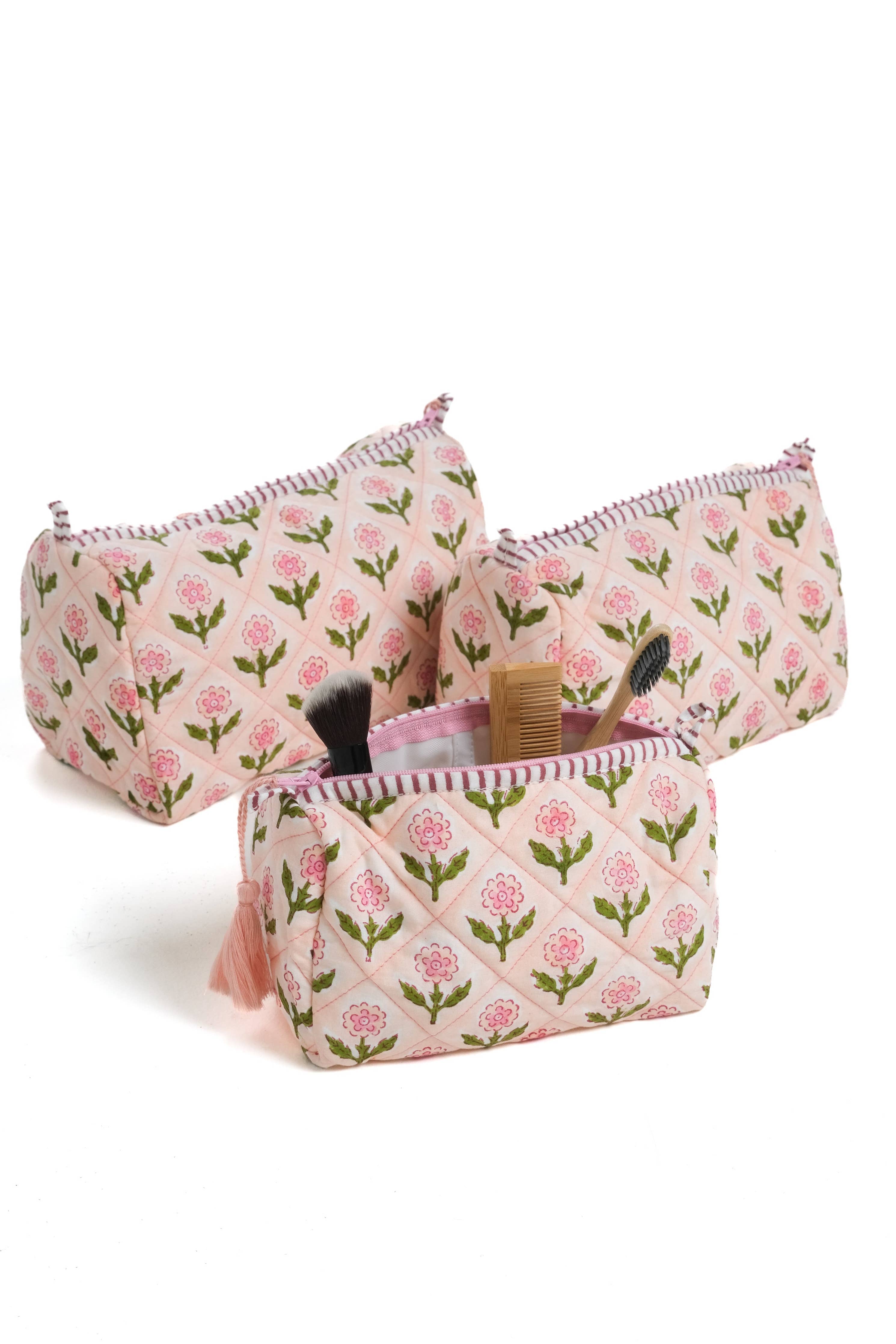 Mona Blockprint Makeup Bag in Pink showing wipeable liner
