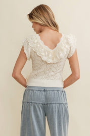Cream Ruffle Knit Lace Top showing ruffle detailing across the neckline and shoulders