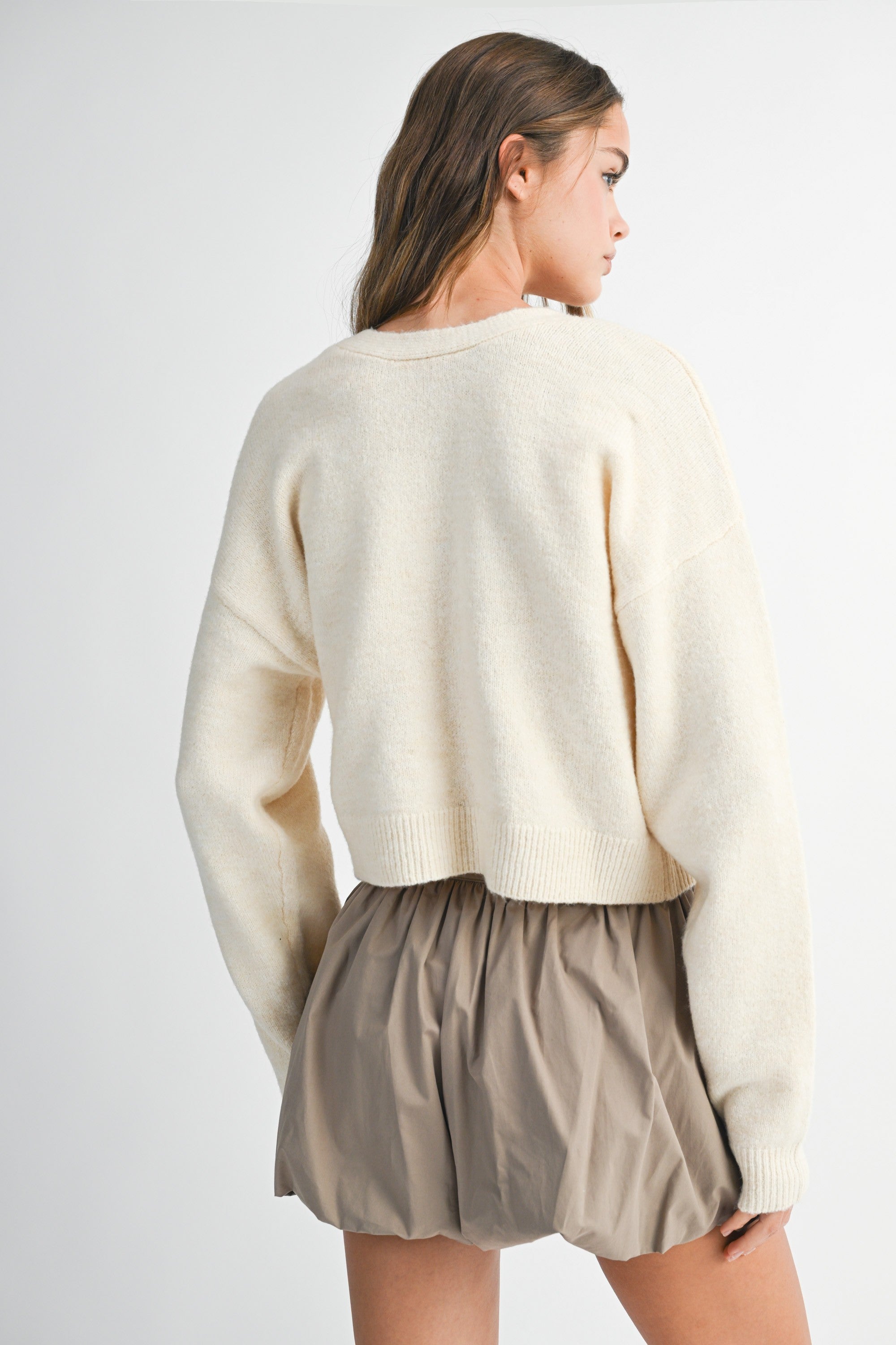 Cream Reversible Bow Sweater