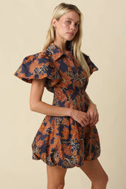 Navy & Orange Floral Bubble Mini Dress showing collared neckline