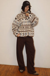 Cream Patterned Fleece Pullover in a relaxed