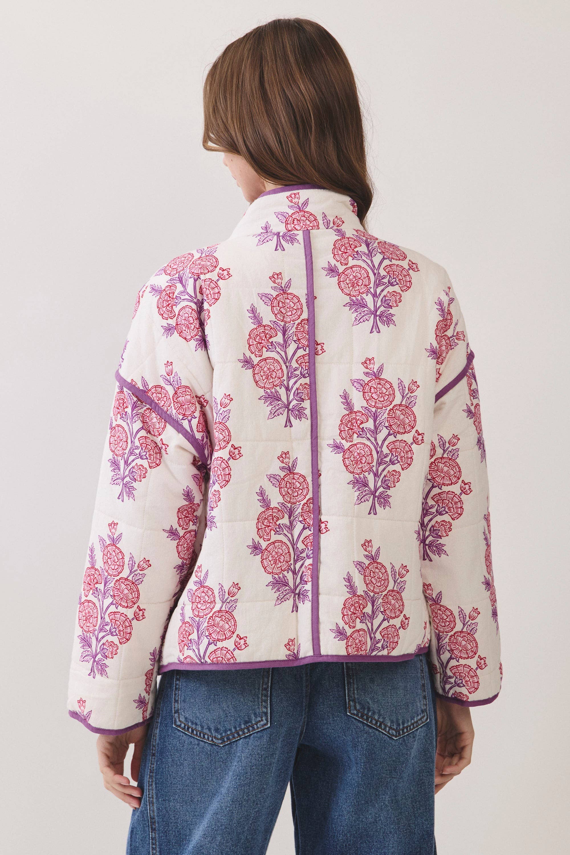 Floral Print Quilted Jacket showing oversized front patch pockets