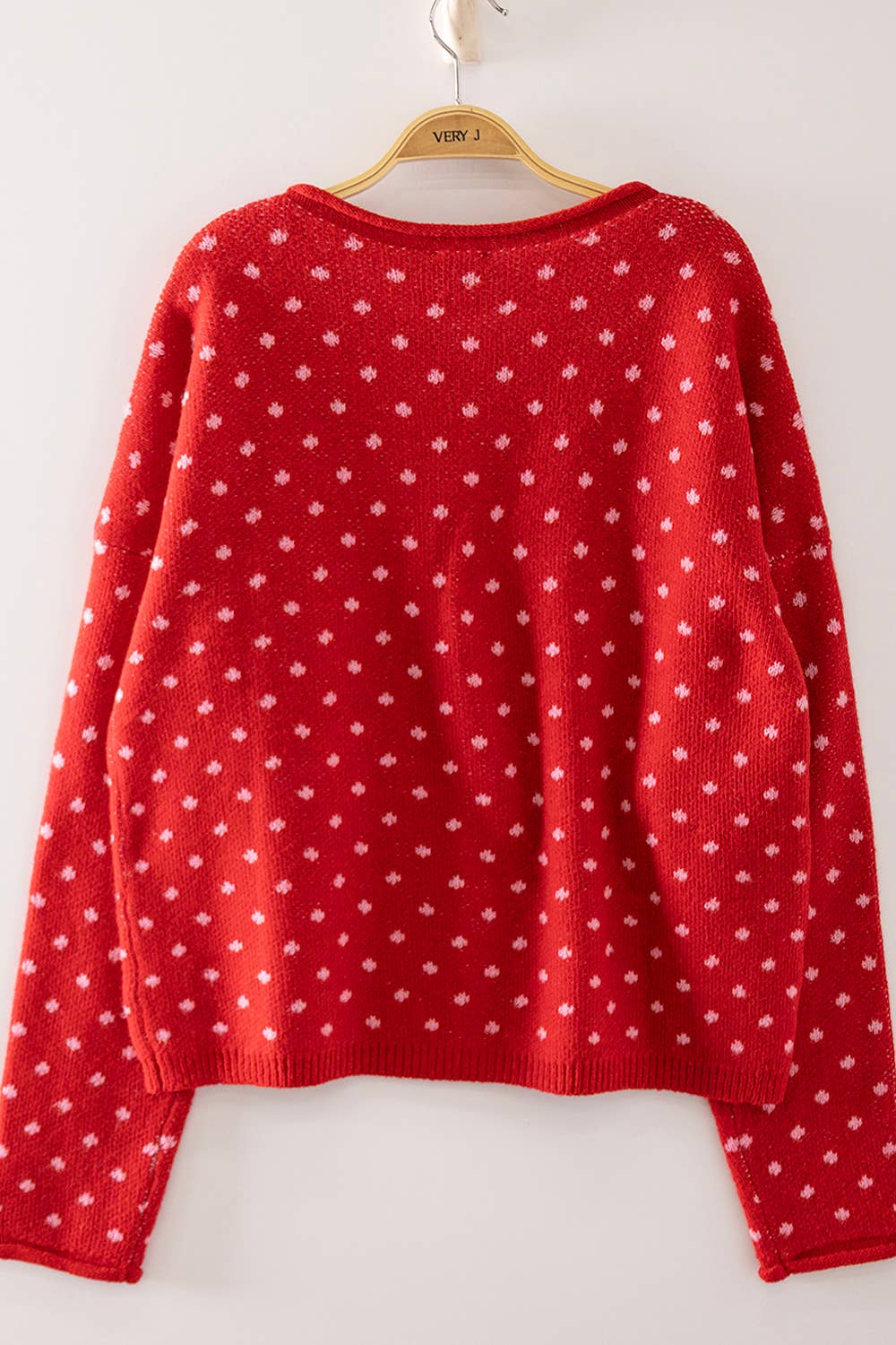 Red Polka Dot Sweater showing round neckline