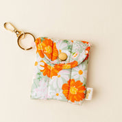 Orange Floral Earbud Case Keychain