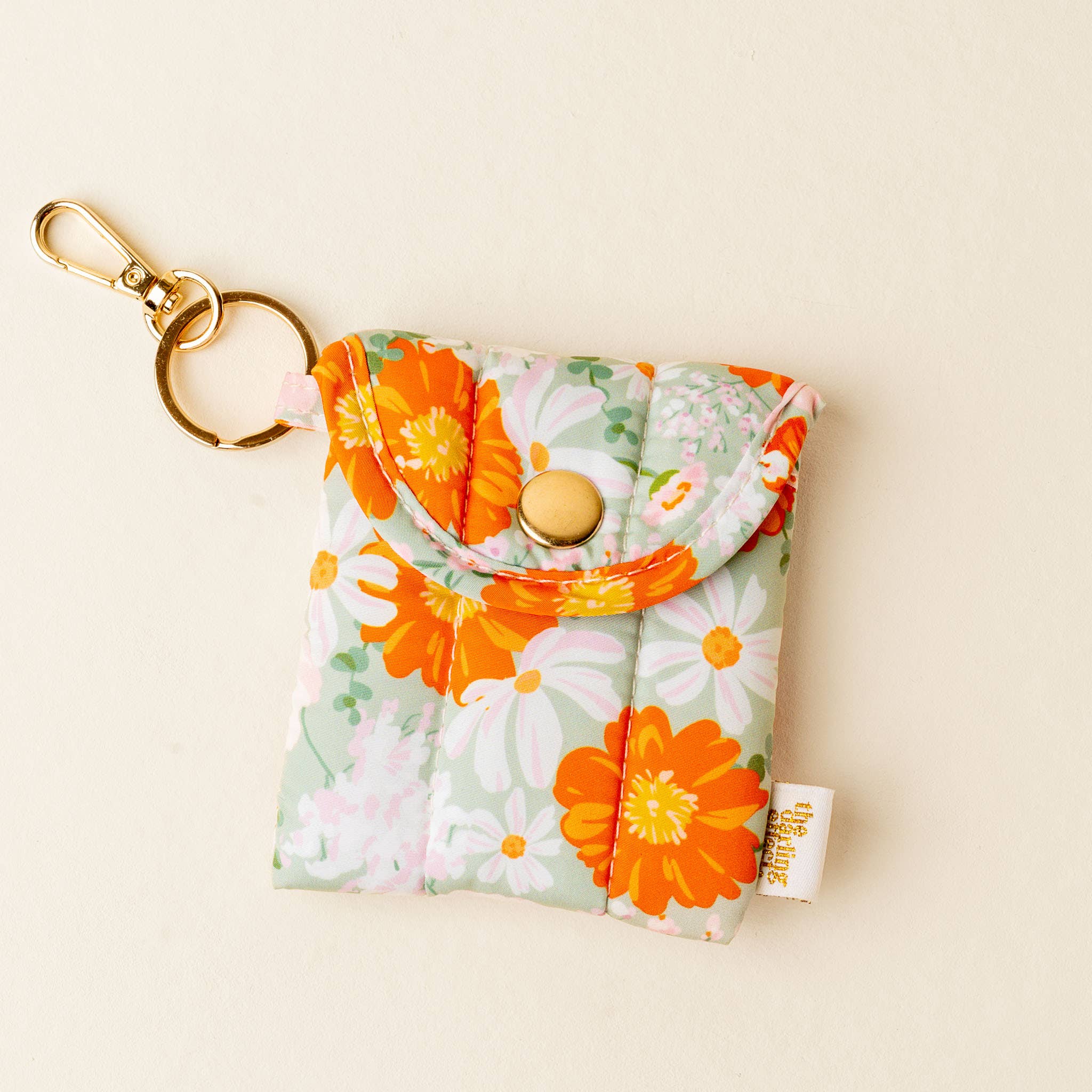 Orange Floral Earbud Case Keychain
