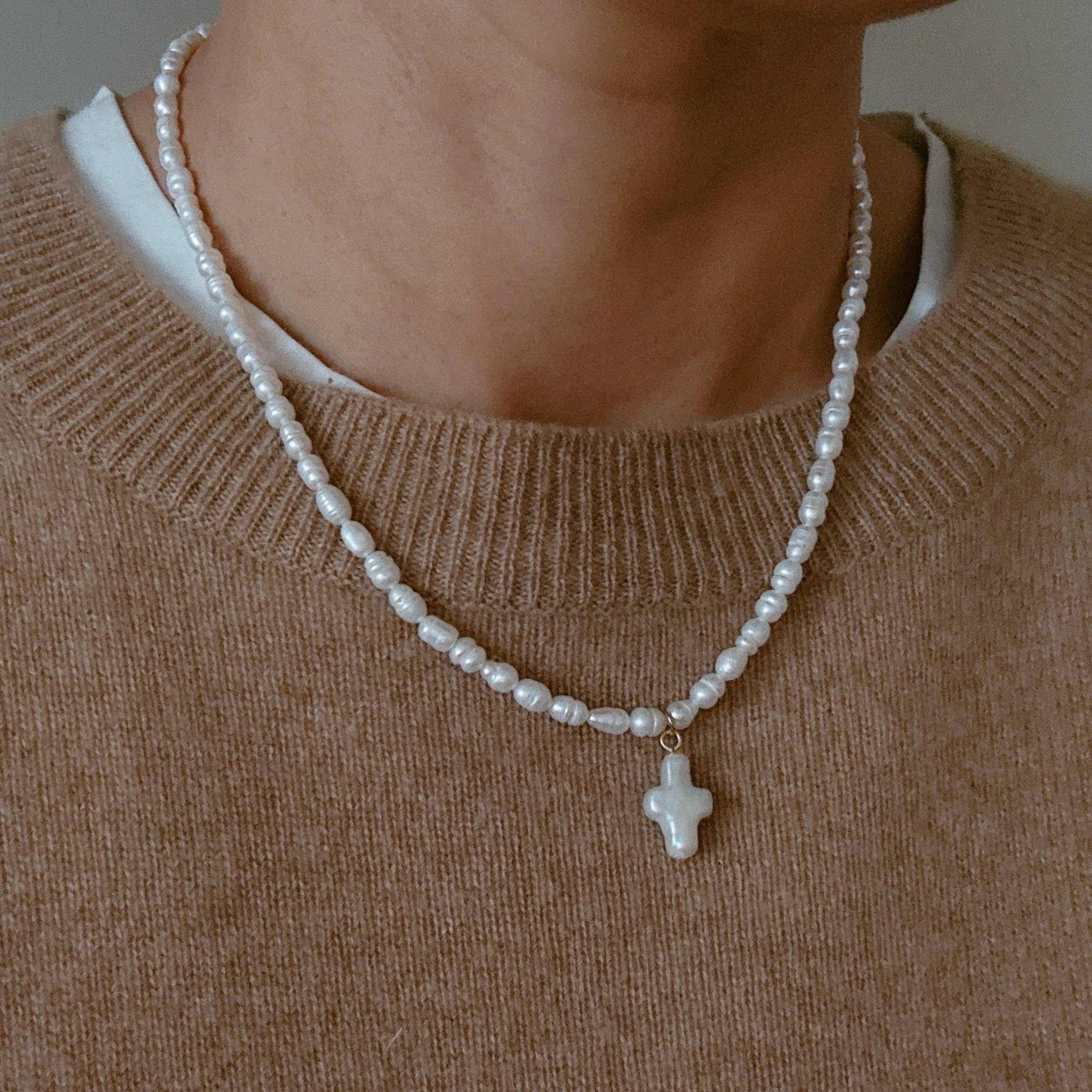 Genuine Freshwater Pearl Cross Necklace — color: ivory white pearls with gold-tone findings and strand of small