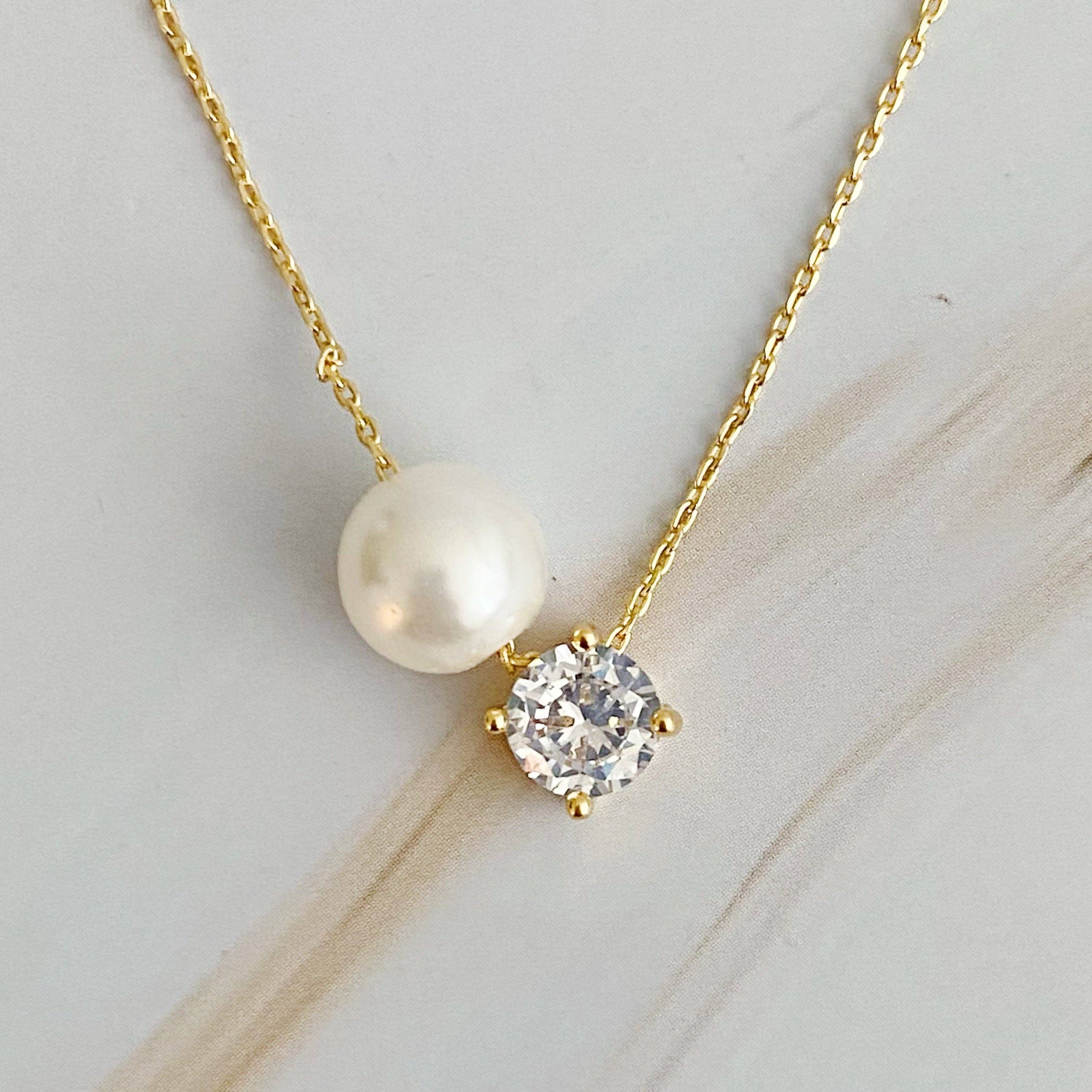 Single Pearl And Diamond Necklace — fine cable chain and lobster clasp closure