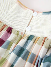 THANKFUL Smocked Plaid Dress showing soft plaid pattern