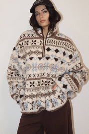 Cream Patterned Fleece Pullover showing sherpa