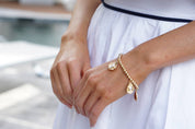 Oyster & Pearl Stretch Bracelet in Shiny Gold from Ninety Nine Boutique