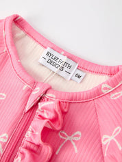 Christmas Bow Pink Romper with Hat: Sweet and Stylish Baby Outfit