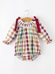 THANKFUL Smocked Plaid Bubble Romper — oversized bow shoulder straps and long puff sleeves