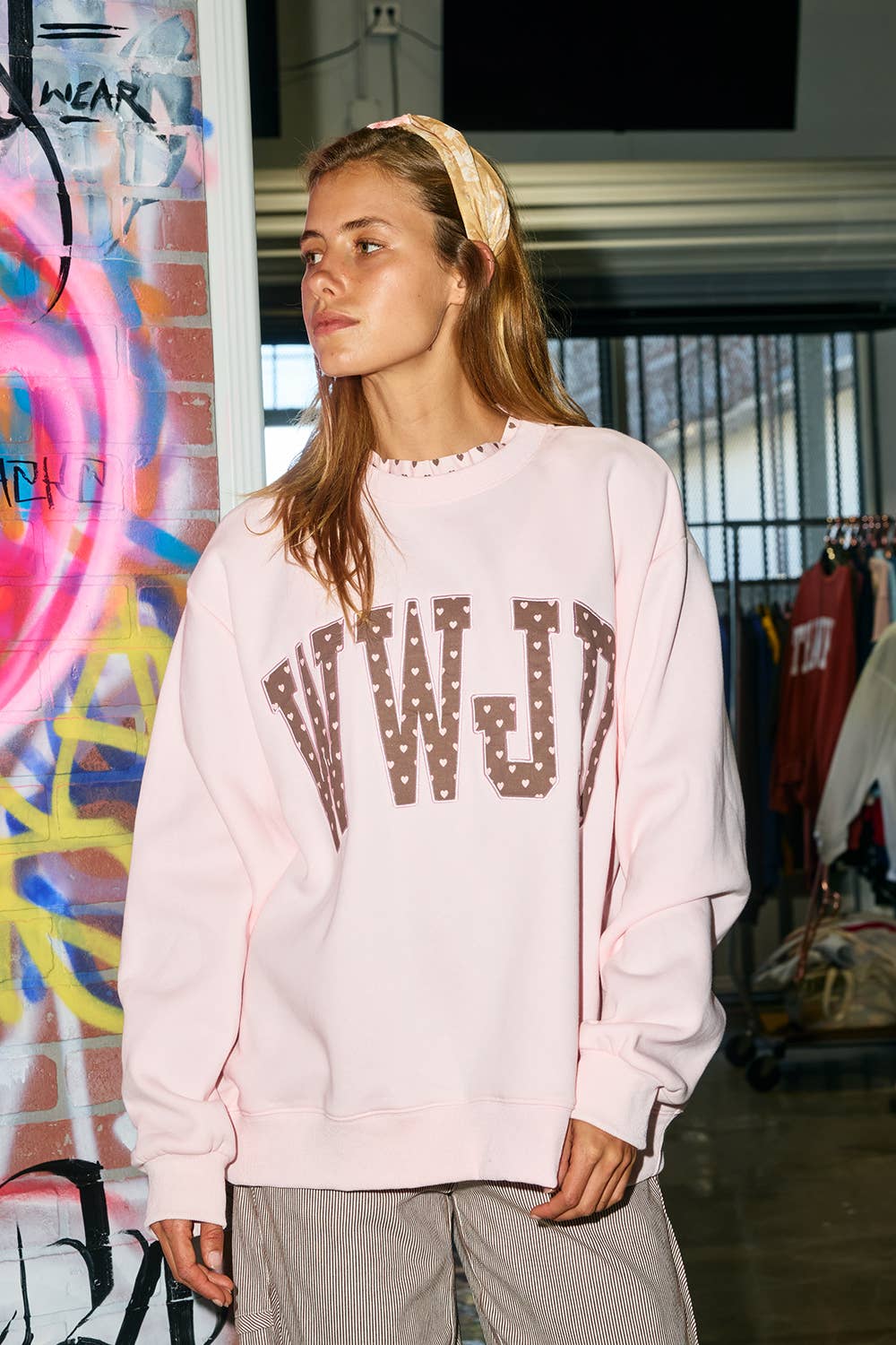 WWJD Heart Printed Mockneck showing ribbed crewneck with ruffle trim
