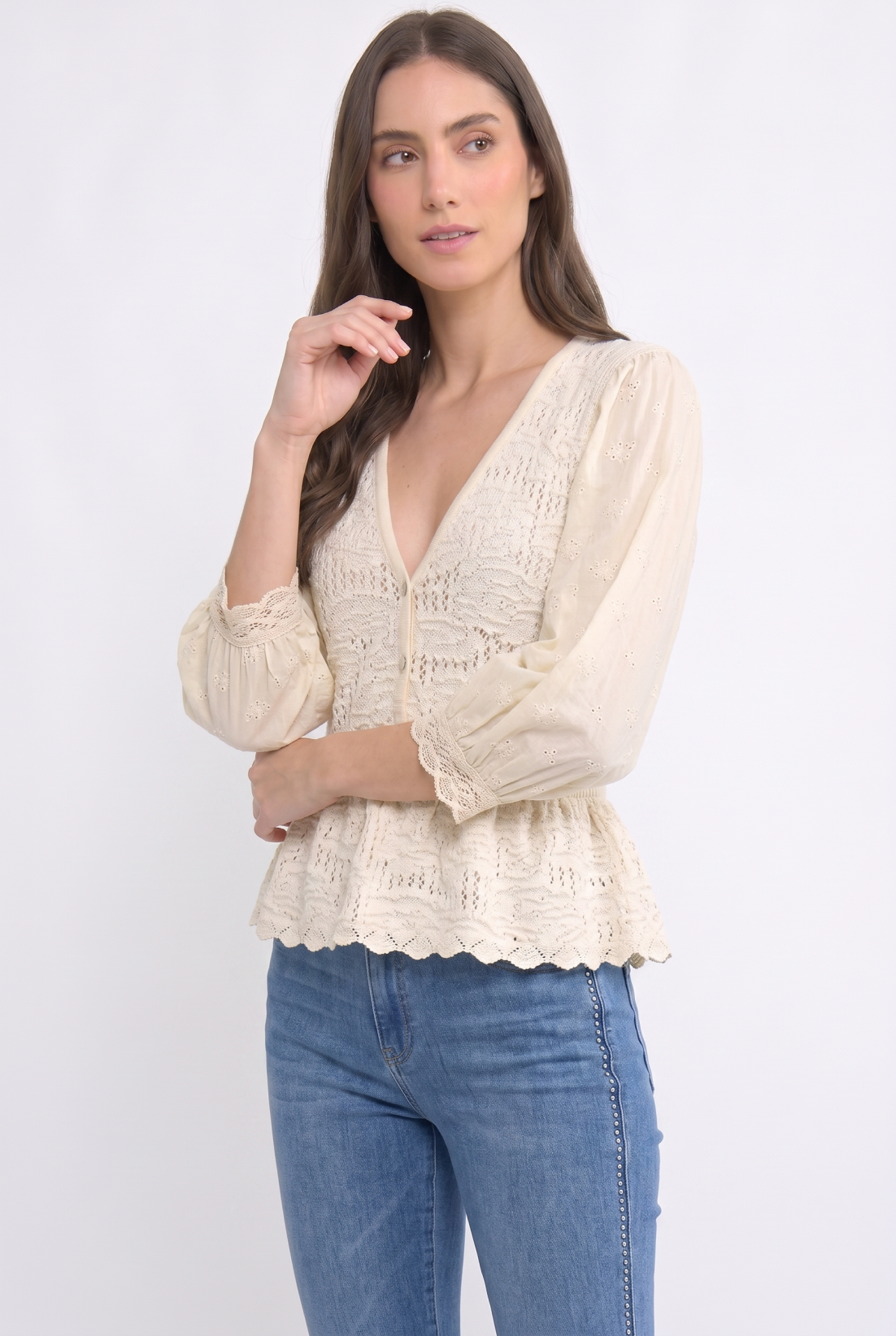 Peplum Eyelet Sleeve Knit Blouse showing 3/4 length puff sleeves