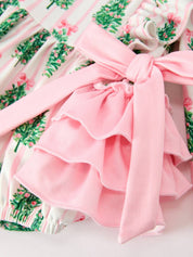 Christmas Tree Ruffle Bubble Romper showing side bow accents