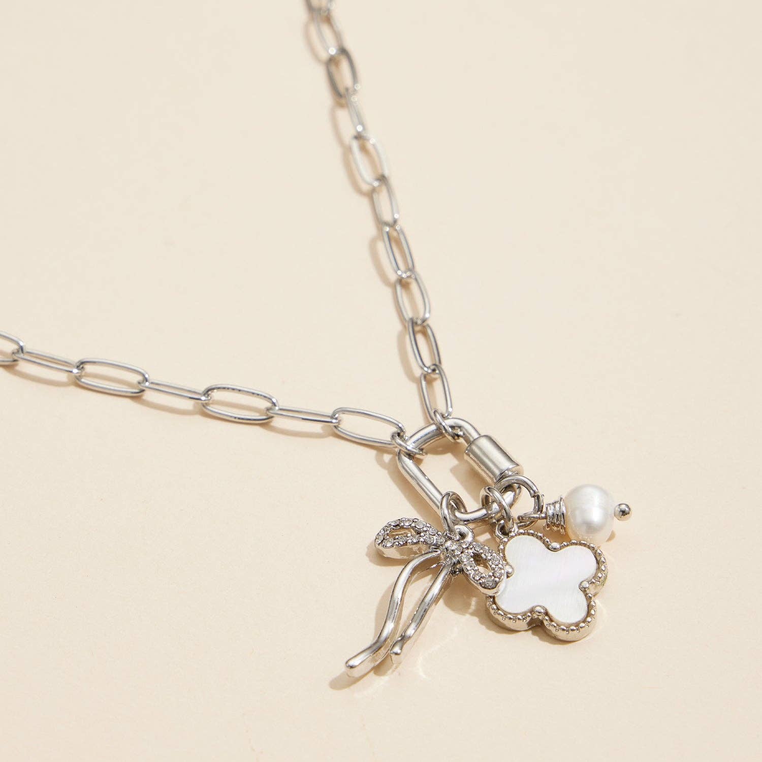 Gold Dipped Bow Charm Necklace with Clover & Pearl
