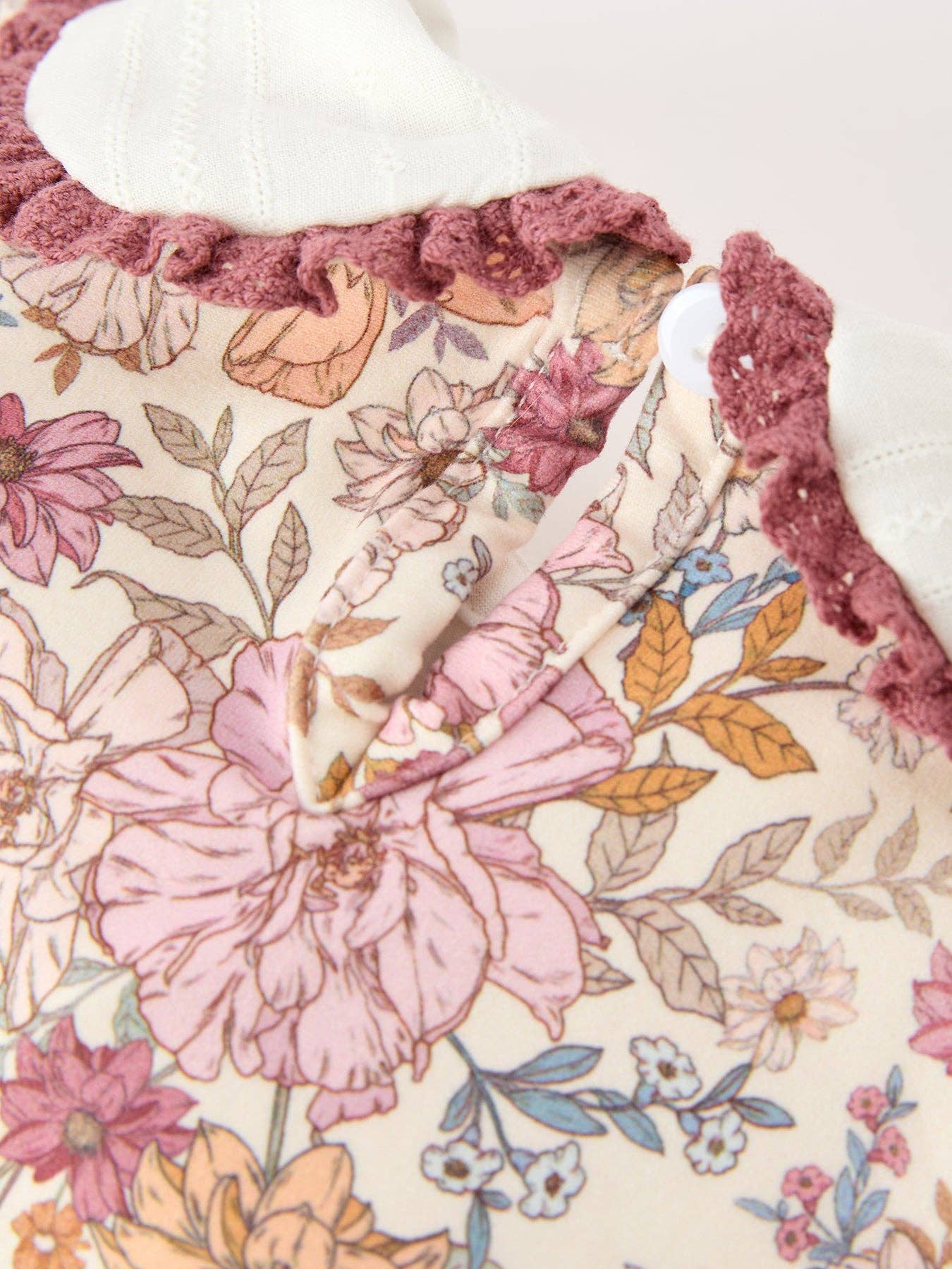 Fall Floral Bubble Romper showing bottom snaps