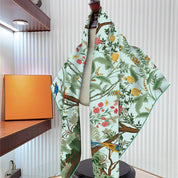 Blue Jungle Birds Twill Silk Sun Scarf showing color: blue