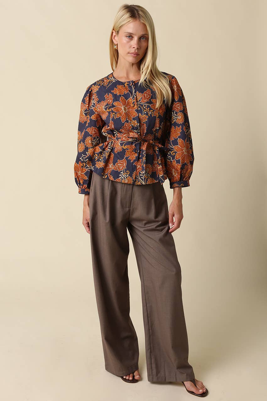 Navy & Orange Floral Tie Waist Blouse showing puff sleeves