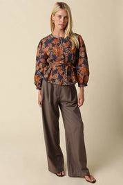 Navy & Orange Floral Tie Waist Blouse showing puff sleeves