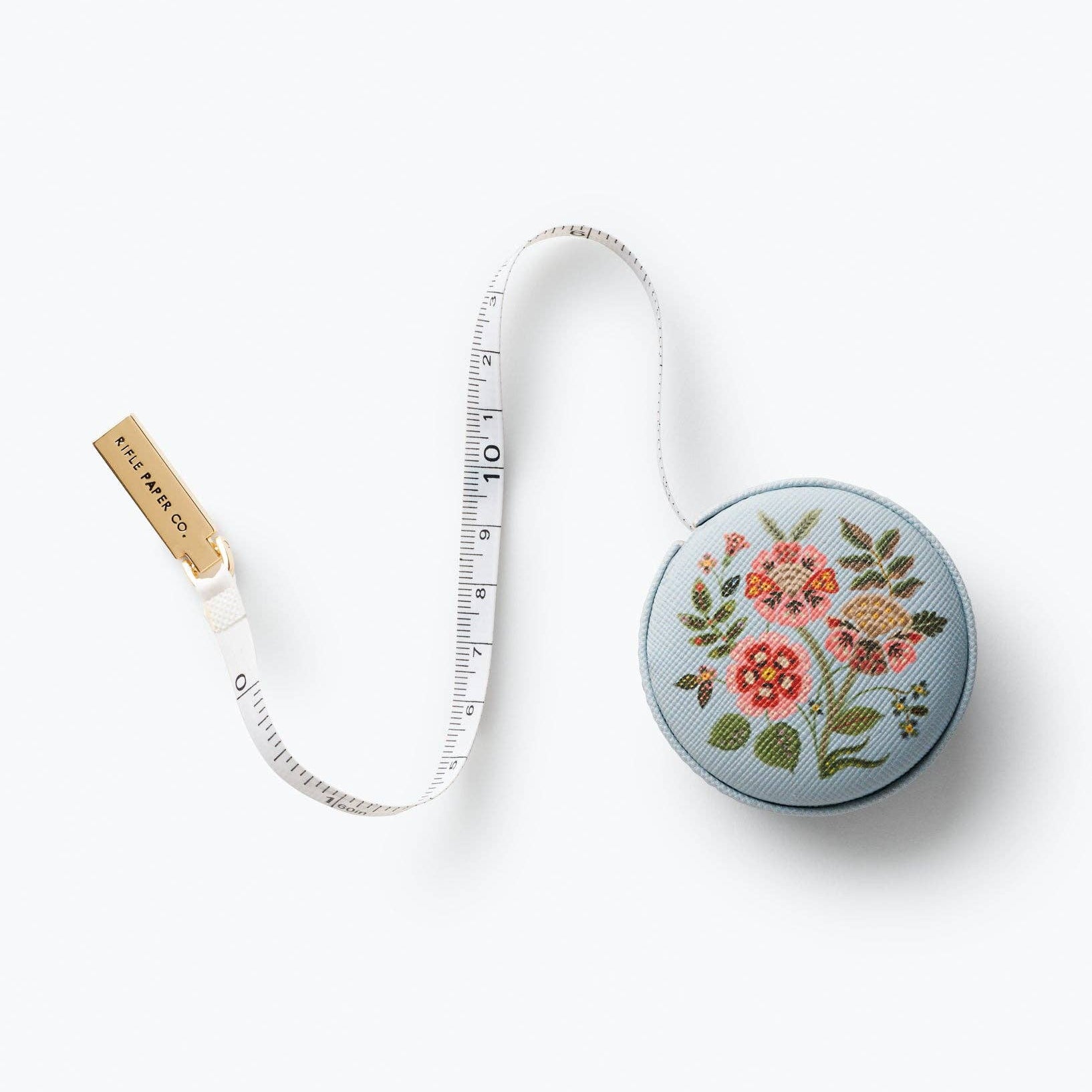 Gracie Measuring Tape — textured PU with metal hardware and printed in full color