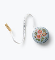 Gracie Measuring Tape — textured PU with metal hardware and printed in full color