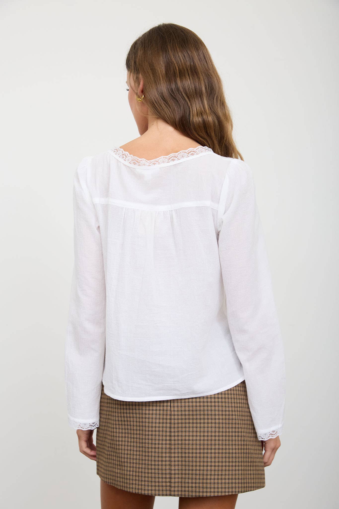 White Lace Trim Long Sleeve Top showing color: white with white lace trim