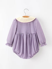 Purple Plaid Floral Bubble Romper showing front buttons