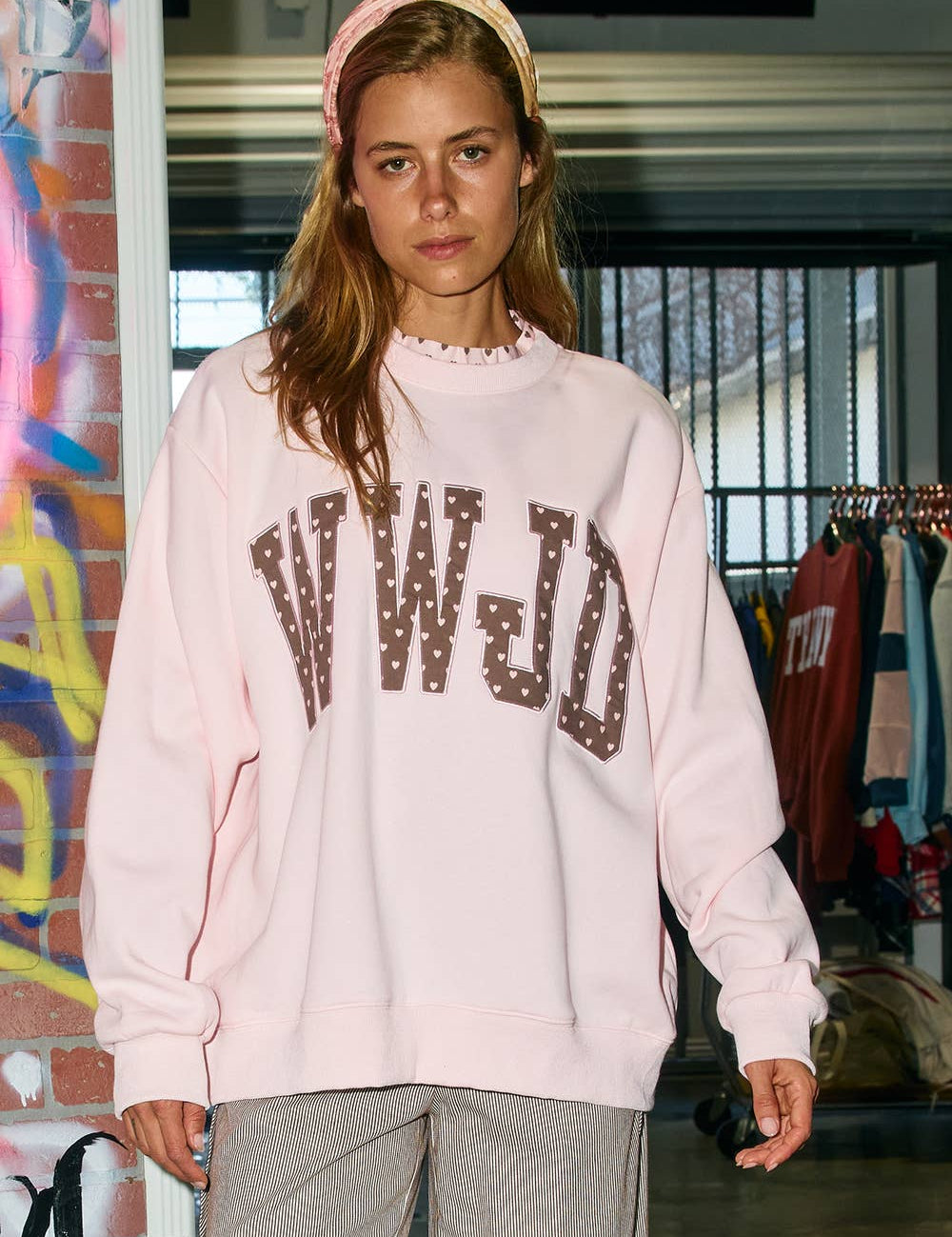 WWJD Heart Printed Mockneck — ribbed crewneck with ruffle trim and ribbed cuffs