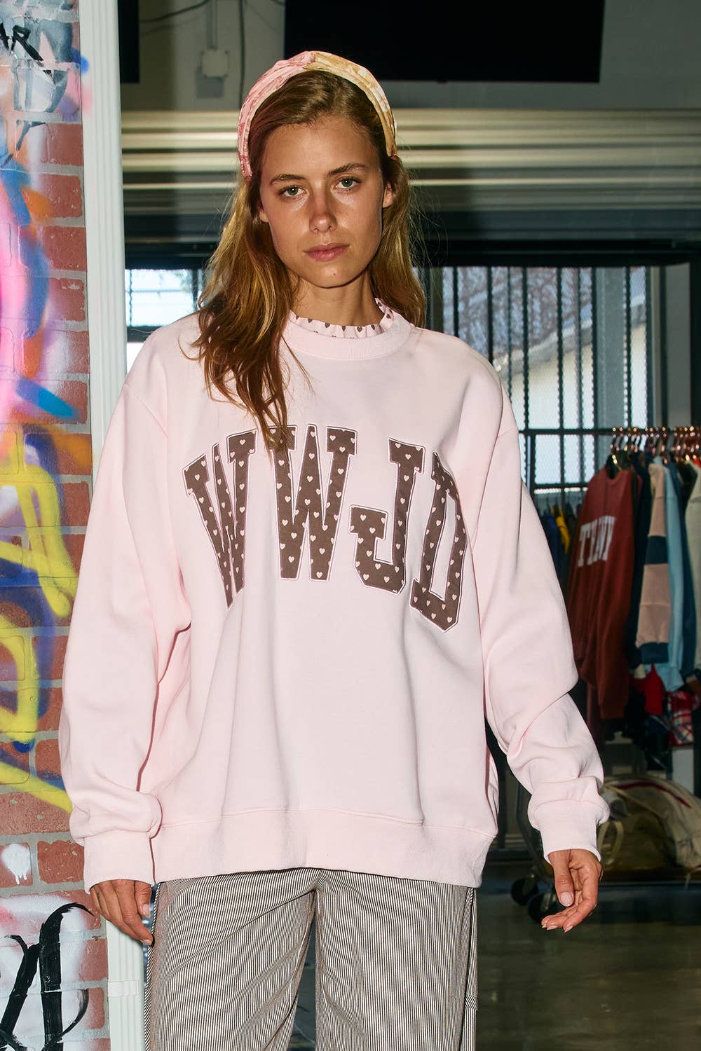 WWJD Heart Printed Mockneck — ribbed crewneck with ruffle trim and ribbed cuffs