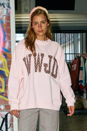 WWJD Heart Printed Mockneck — ribbed crewneck with ruffle trim and ribbed cuffs