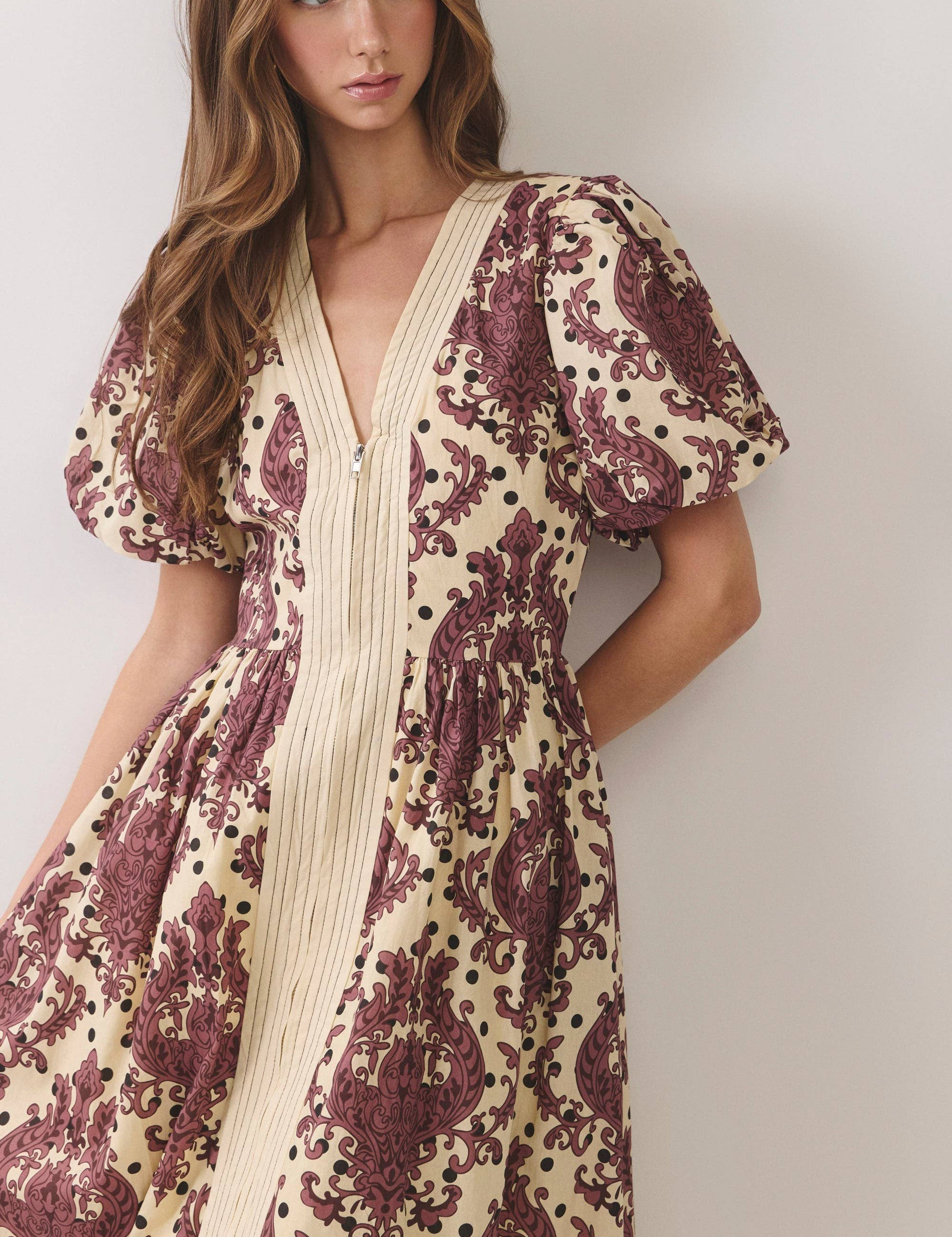 Cream & Burgundy Paisley Midi Dress showing v-neckline