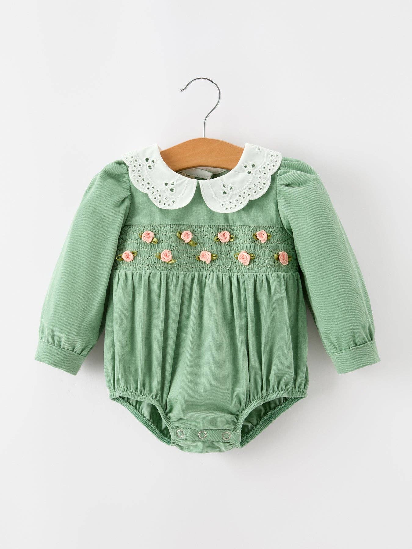 Green Smocked Floral Romper — smocked chest panel and long puff sleeves
