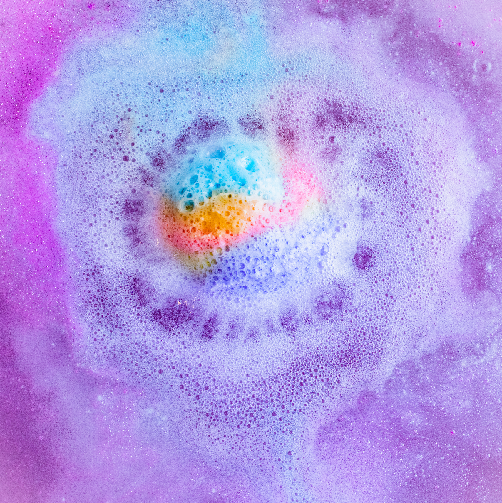 Rainbow Connection Bath Balm showing wrapped in purple tissue with a hang tag for gifting