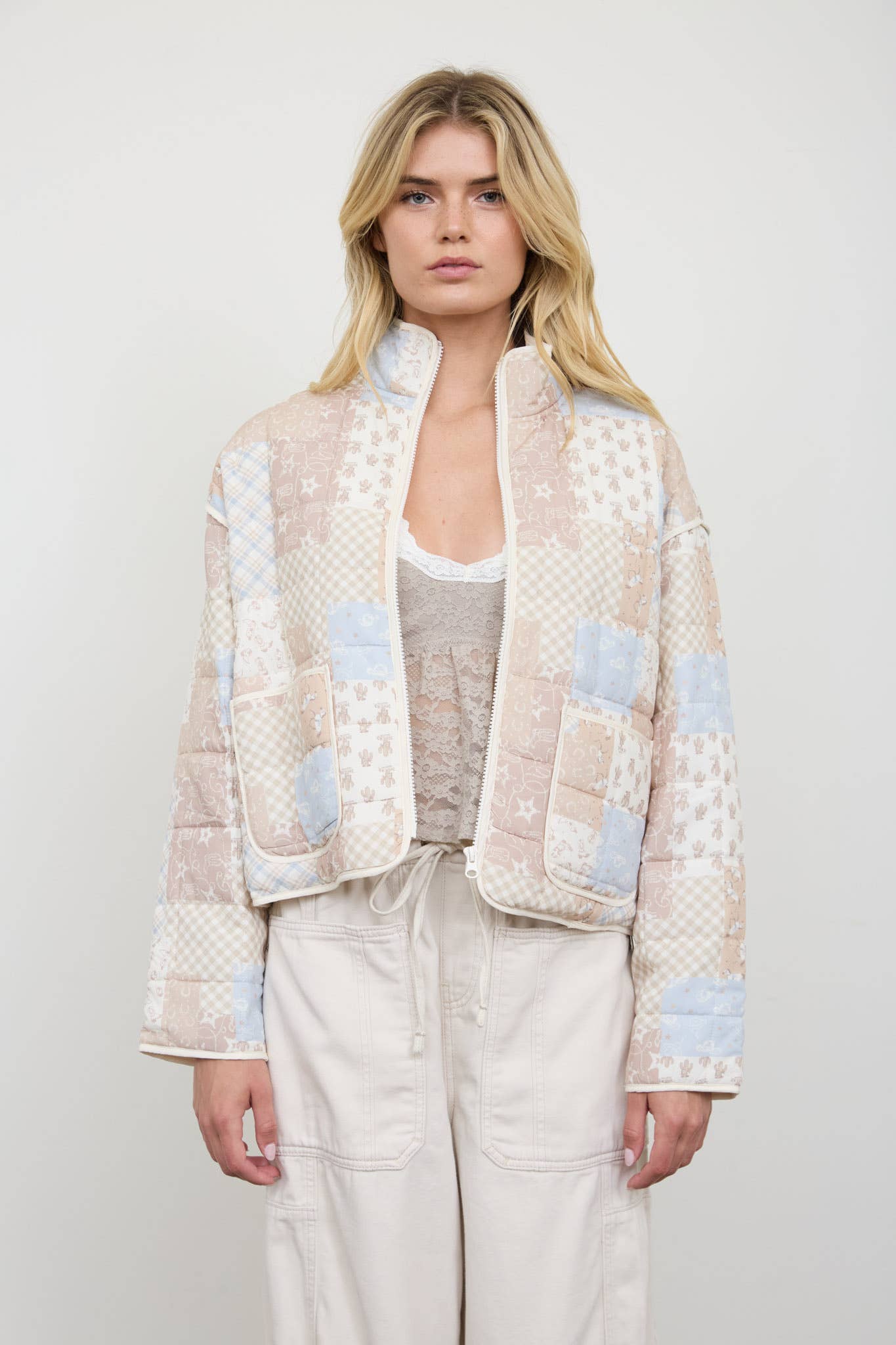 Cream Patchwork Quilted Jacket showing drop shoulder