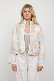 Cream Patchwork Quilted Jacket showing drop shoulder