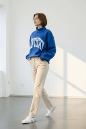 Blue Kentucky Reversible Mockneck showing ribed banded hemline and cuffs