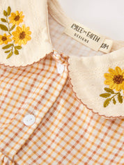 Orange Plaid Floral Bubble Romper showing long sleeves