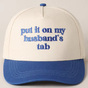 Blue Put It On My Husband's Tab Hat — “put it on my husband’s tab” across the front and embroidered detailing