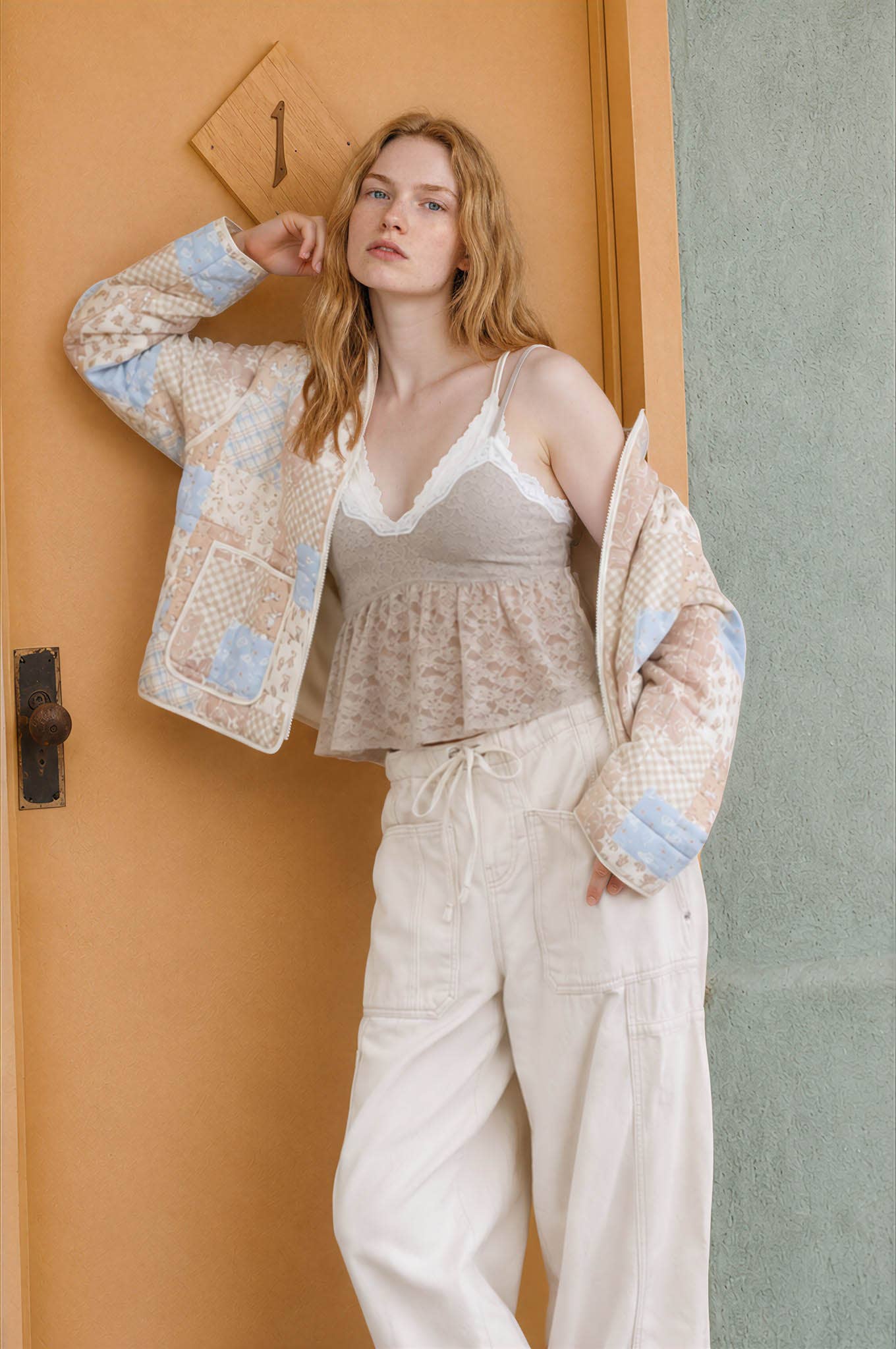 Cream Patchwork Quilted Jacket — color: cream, beige and light blue patchwork print and mock neckline with a stand collar