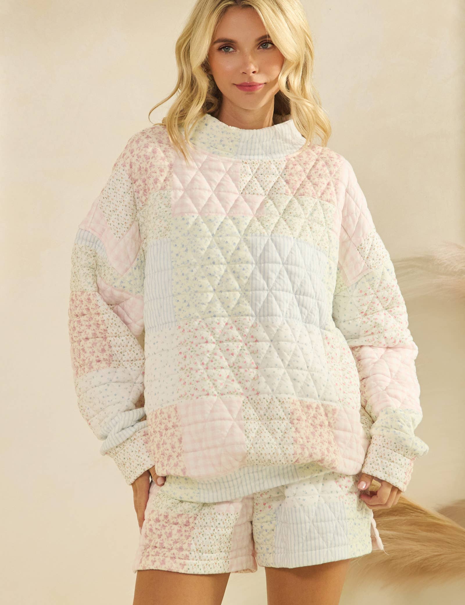 Floral textured mock neck sweater