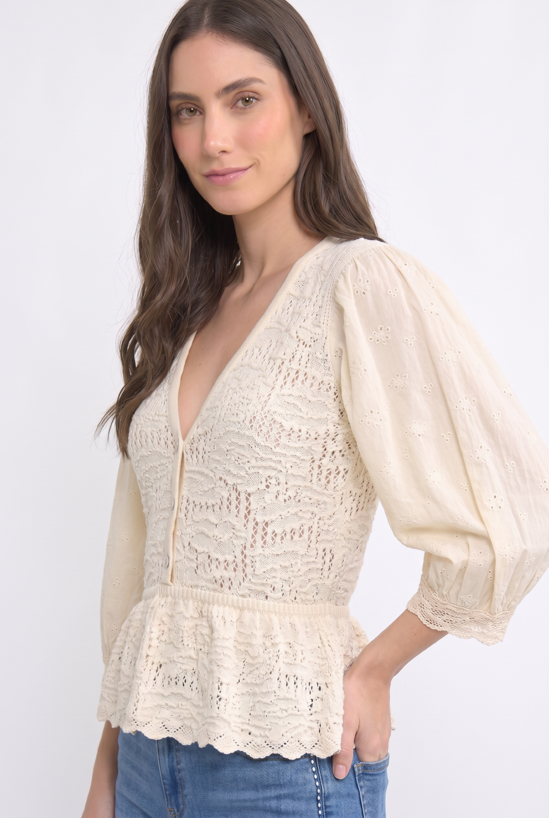 Peplum Eyelet Sleeve Knit Blouse showing scalloped hem