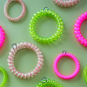Spiral Hair Coils | Small | Tropical Punch showing holds hair without creasing or denting