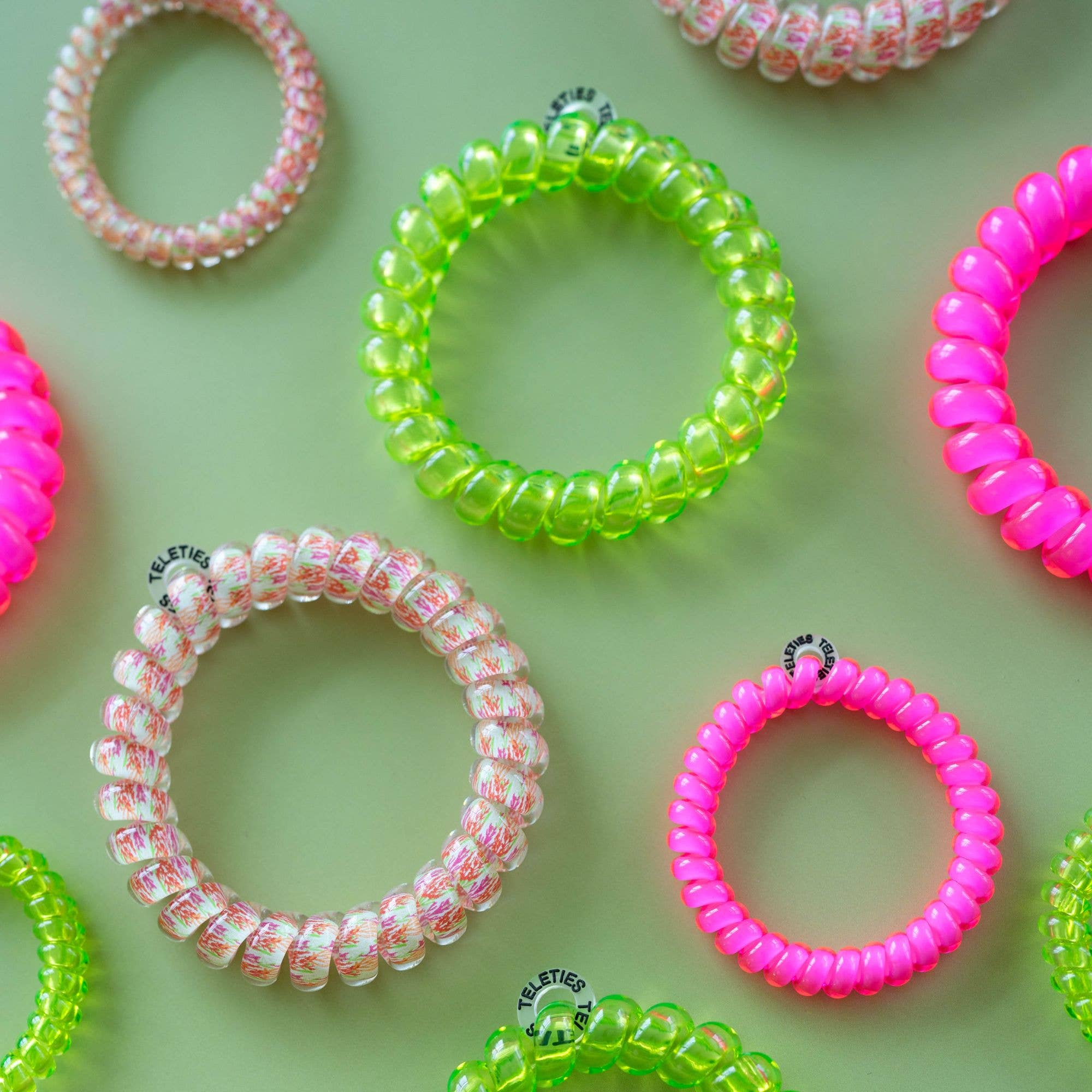 Spiral Hair Coils | Small | Tropical Punch showing holds hair without creasing or denting