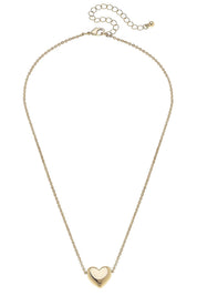 Tatum Heart Necklace in Shiny Gold — features a shiny gold heart pendant and adds a subtle, romantic touch to any outfit